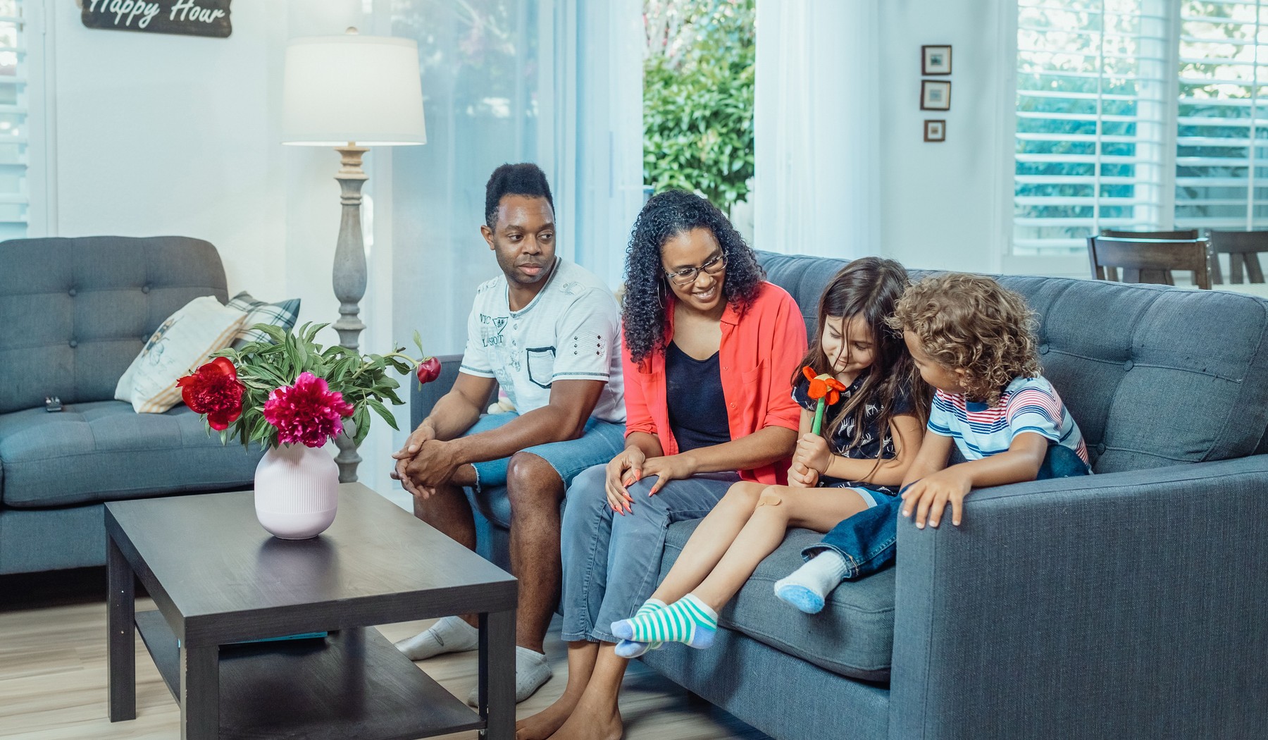 Father connecting with children in a diverse family